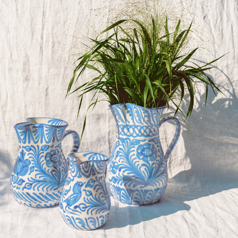 Small pitcher with hand painted designs