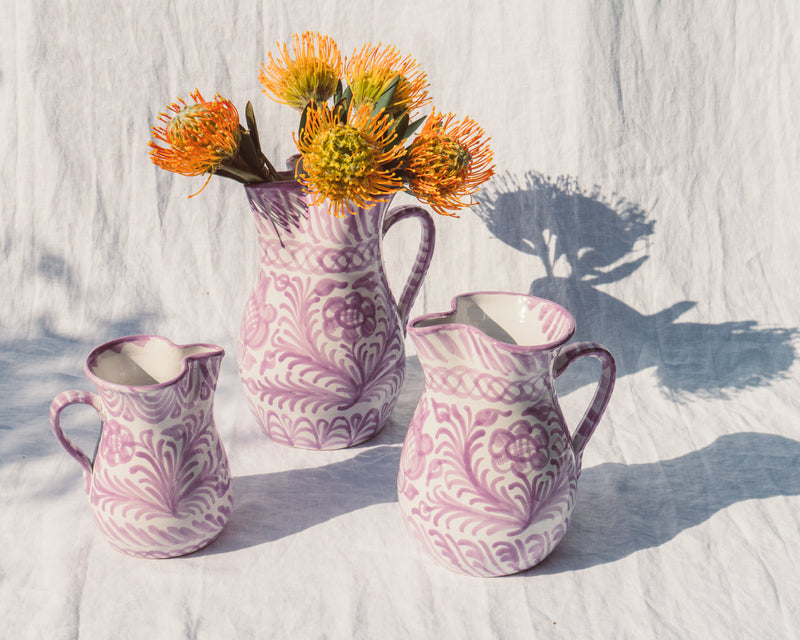 Medium pitcher with hand painted designs