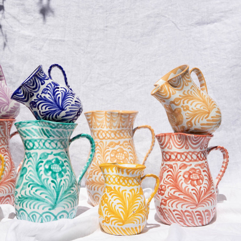 Large pitcher with hand painted designs
